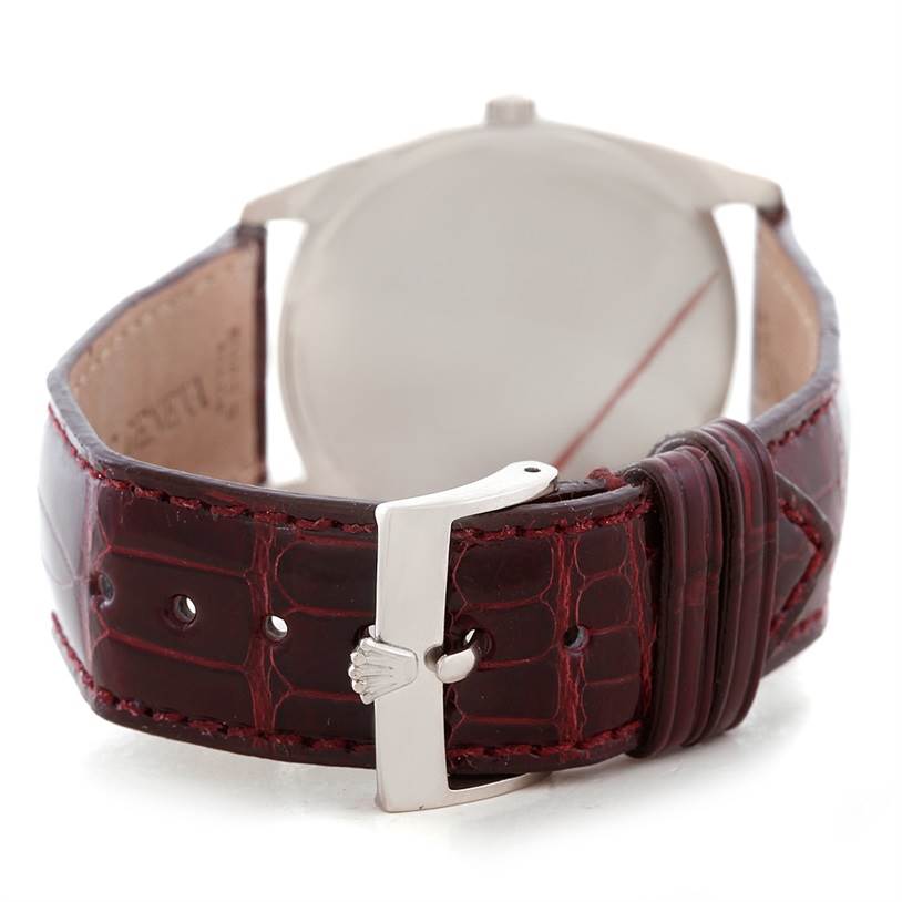 The image shows the rear view of a Rolex Cellini 4233 Men's White Gold White Dial 4233 Men's White Gold White Dial watch, focusing on its brown leather strap and clasp.