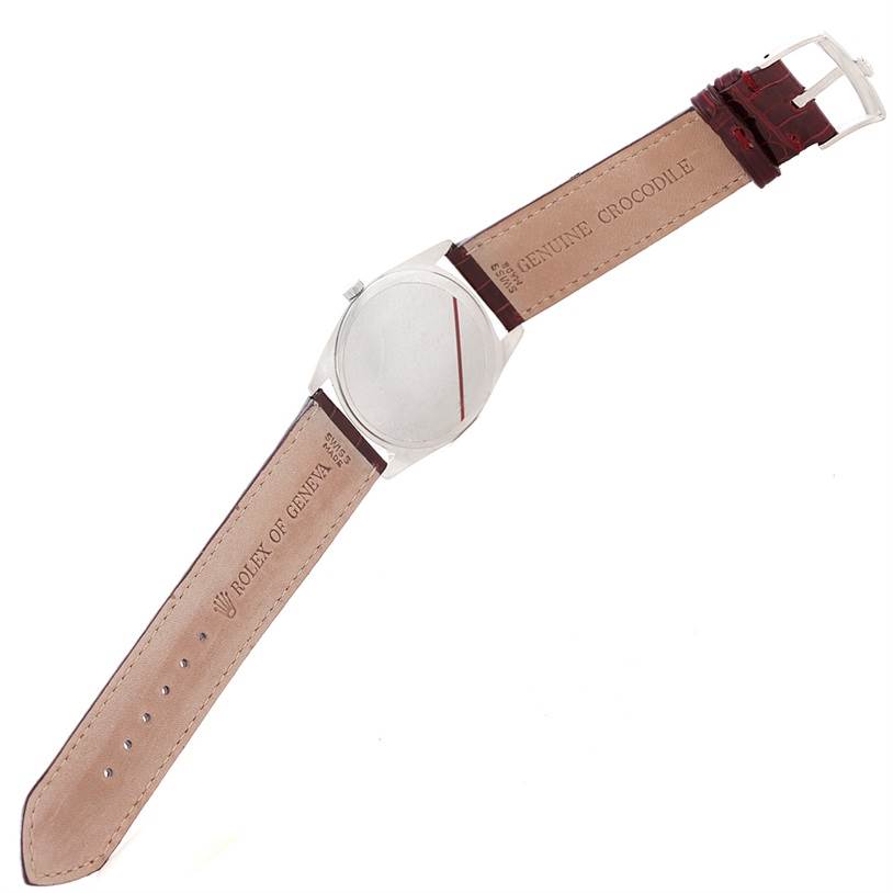 The image shows the back and inside of the leather strap of a Rolex Cellini 4233 Men's White Gold White Dial 4233 Men's White Gold White Dial watch, viewed from the top.