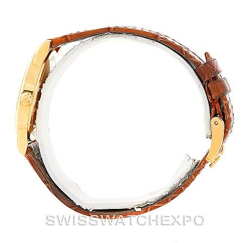 The image shows a side profile of a Rolex Cellini 5116 Men's Yellow Gold Silver Dial 5116 Men's Yellow Gold Silver Dial watch, highlighting the case, crown, and brown leather strap.