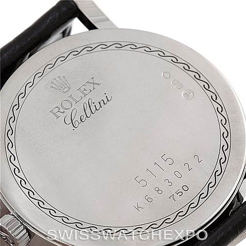 This image shows the back case of a Rolex Cellini 5115 Men's White Gold Black Dial 5115 Men's White Gold Black Dial watch, displaying engravings, serial numbers, and hallmarks.