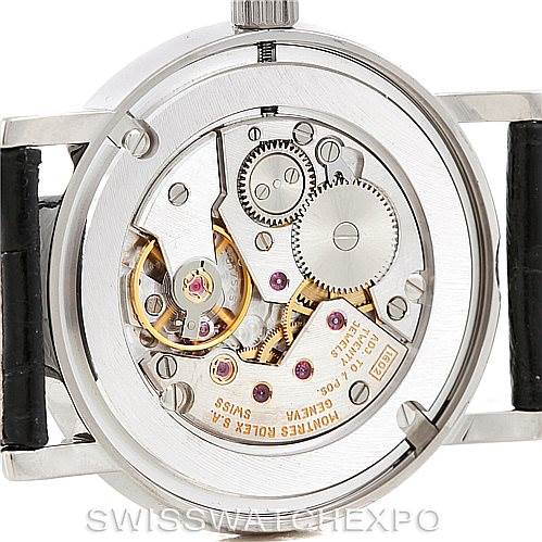 This image shows the back view of the Rolex Cellini 5115 Men's White Gold Black Dial 5115 Men's White Gold Black Dial watch, revealing its intricate mechanical movement and components.