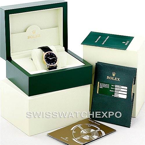 This image shows the Rolex Cellini 4233 Men's White Gold Black Dial 4233 Men's White Gold Black Dial watch, its box, warranty card, and additional accessories from a front angle.