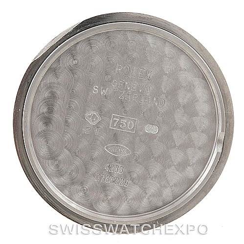 This image shows the inside case back of a Rolex Cellini 4233 Men's White Gold Black Dial 4233 Men's White Gold Black Dial watch, displaying various markings and engravings.