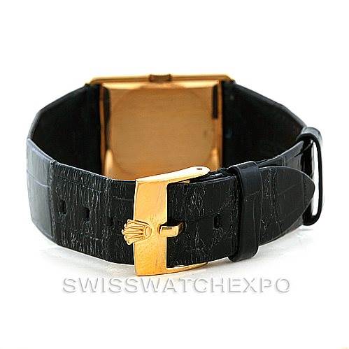 The image shows the back of a Rolex Cellini 4016 Men's Yellow Gold White Dial 4016 Men's Yellow Gold White Dial watch, highlighting its black leather strap and gold buckle clasp.