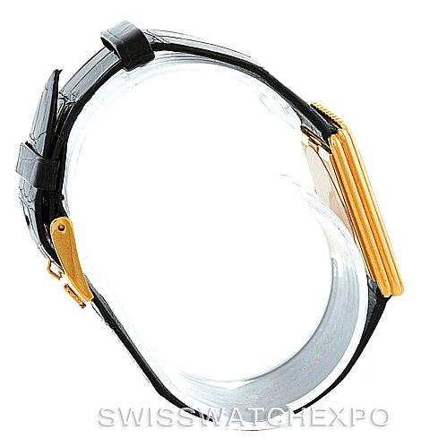 This image shows a side view of the Rolex Cellini 4016 Men's Yellow Gold White Dial 4016 Men's Yellow Gold White Dial watch, highlighting the black leather strap and gold side case.