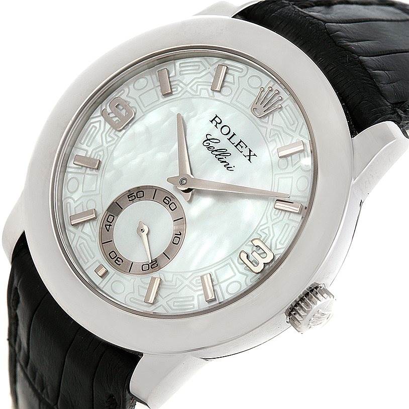 The Rolex Cellini 5240 Men's Platinum Mother of Pearl Dial 5240 Men's Platinum Mother of Pearl Dial watch is shown at an angled side view, highlighting its dial, crown, and part of the leather strap.