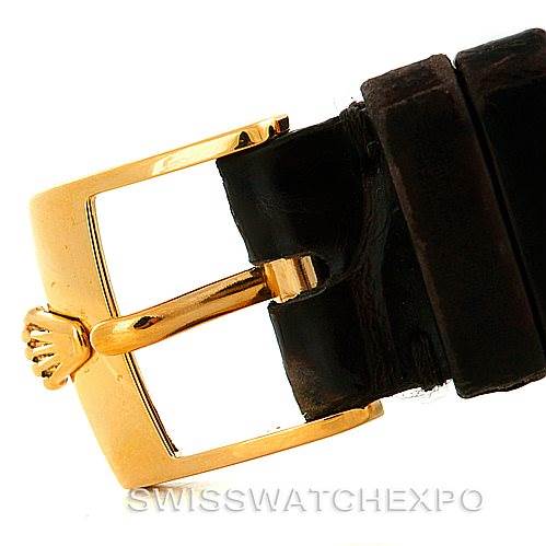 This image shows a close-up of the gold-toned buckle and black leather strap of a Rolex Cellini 5112 Men's Yellow Gold Mother of Pearl Dial 5112 Men's Yellow Gold Mother of Pearl Dial watch.