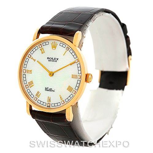 The image shows a Rolex Cellini 5112 Men's Yellow Gold Mother of Pearl Dial 5112 Men's Yellow Gold Mother of Pearl Dial model watch from an angled front view, highlighting its gold case, white dial, and leather strap.