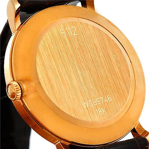 The image shows the back case of a Rolex Cellini 5112 Men's Yellow Gold Mother of Pearl Dial 5112 Men's Yellow Gold Mother of Pearl Dial watch, highlighting the engraved model number and 18K gold mark.