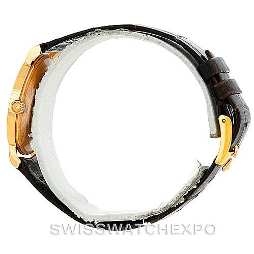 The Rolex Cellini 5112 Men's Yellow Gold Mother of Pearl Dial 5112 Men's Yellow Gold Mother of Pearl Dial watch is shown in a side profile, displaying its case, crown, and leather strap with a clasp.