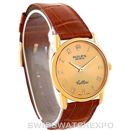 The image shows a Rolex Cellini 5116 Men's Yellow Gold Champagne Dial 5116 Men's Yellow Gold Champagne Dial watch with a brown leather strap and a gold-tone dial photographed from a three-quarter angle.