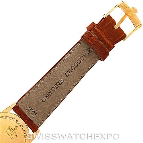 This image shows the back of the band and the buckle of a Rolex Cellini 5116 Men's Yellow Gold Champagne Dial 5116 Men's Yellow Gold Champagne Dial watch, featuring a "Genuine Crocodile" leather strap.