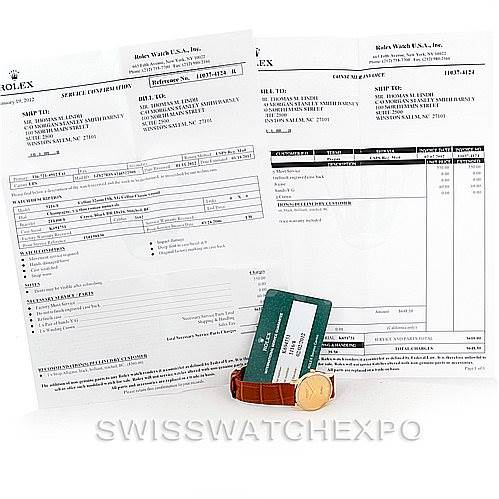 The image shows documents, a guarantee card, and a leather strap of a Rolex Cellini 5116 Men's Yellow Gold Champagne Dial 5116 Men's Yellow Gold Champagne Dial watch with a portion of the watch face visible.