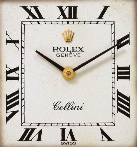 The image shows a close-up of the dial of a Rolex Cellini 4016 Men's Yellow Gold White Dial 4016 Men's Yellow Gold White Dial watch, displaying Roman numerals, the brand logo, and the hands.