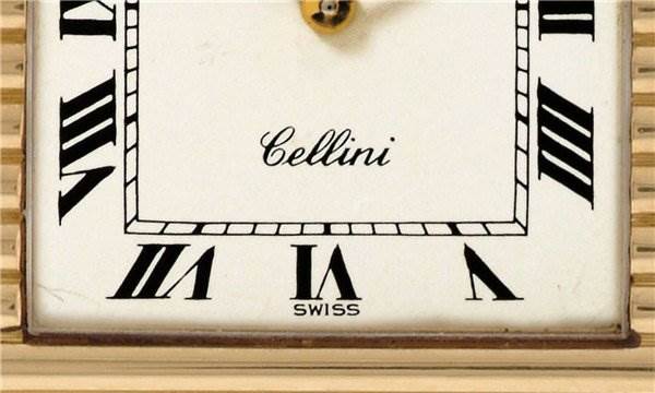 Close-up of a Rolex Cellini 4012 Men's Yellow Gold White Dial 4012 Men's Yellow Gold White Dial watch dial showing Roman numerals, the word "Cellini," and "Swiss" at the bottom.