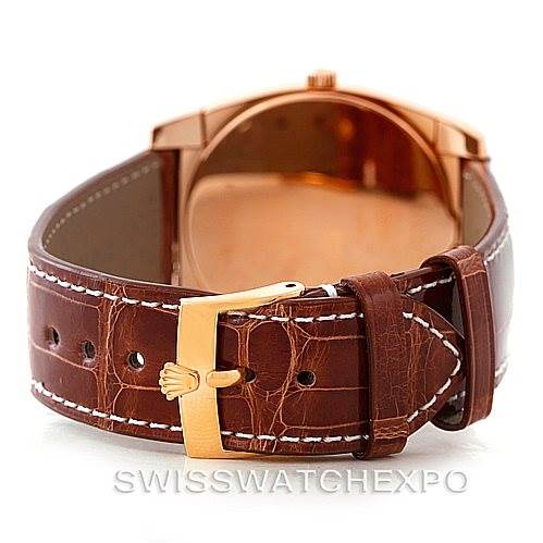 This image shows the back view of a Rolex Cellini 5330 Men's Rose Gold Grey Dial 5330 Men's Rose Gold Grey Dial watch, highlighting its leather strap and gold buckle.