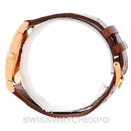 This image shows the side profile of a Rolex Cellini 5330 Men's Rose Gold Grey Dial 5330 Men's Rose Gold Grey Dial watch with a brown leather strap and rose gold casing.