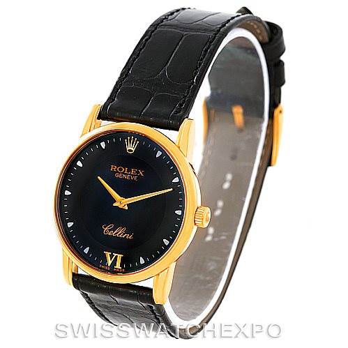 The image shows a Rolex Cellini 5116 Men's Yellow Gold Black Dial 5116 Men's Yellow Gold Black Dial watch at a three-quarter angle, highlighting its black leather strap, gold case, and black dial.
