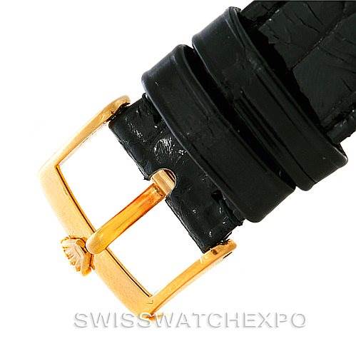 This image shows a close-up of the buckle and strap of a Rolex Cellini 5116 Men's Yellow Gold Black Dial 5116 Men's Yellow Gold Black Dial watch.