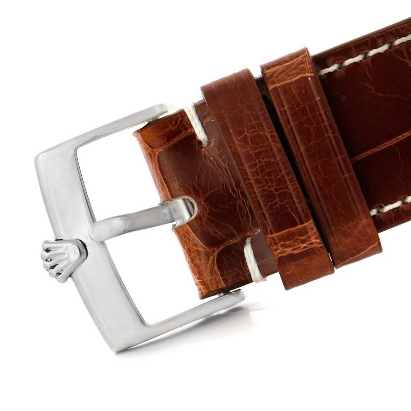 This image shows a close-up of the brown leather strap and buckle of a Rolex Cellini 4233 Men's White Gold Black Dial 4233 Men's White Gold Black Dial watch.