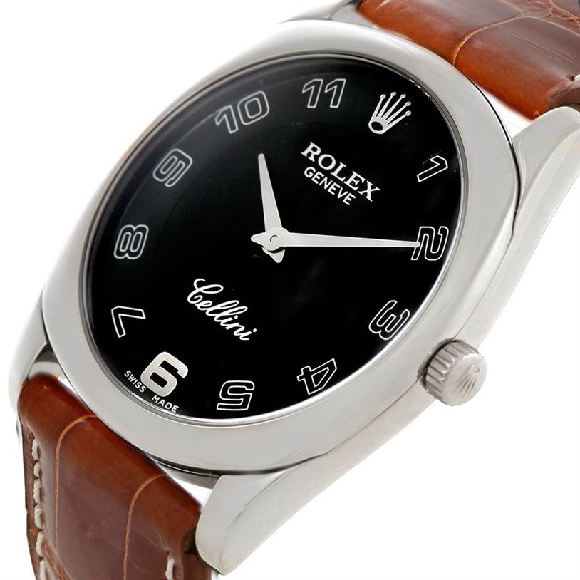 The image shows a close-up angled view of the Rolex Cellini 4233 Men's White Gold Black Dial 4233 Men's White Gold Black Dial watch face, crown, and leather strap.