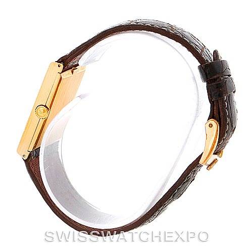 This side view of the Rolex Cellini 4127 Men
s Yellow Gold Brown Dial 4127 Men
s Yellow Gold Brown Dial shows the watch
s brown leather strap, gold case, and crown.