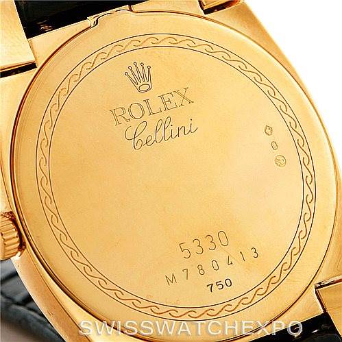 This image shows the case back of a Rolex Cellini 5330 Men's Yellow Gold White Dial 5330 Men's Yellow Gold White Dial model watch, featuring engravings and the brand's logo.