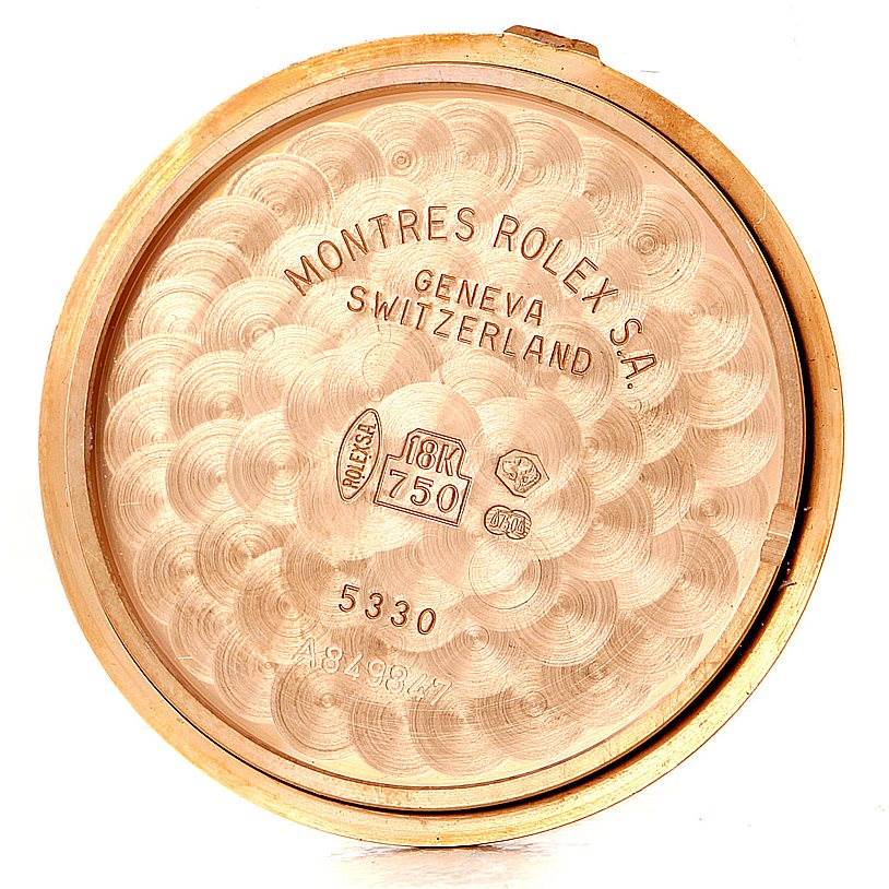 This image shows the inner case back of a Rolex Cellini 5330 Men
s Rose Gold White Dial 5330 Men
s Rose Gold White Dial watch, highlighting the engravings and hallmarks.