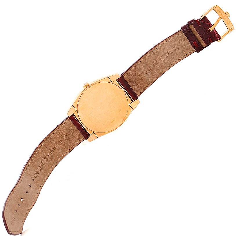 The image shows the back of a Rolex Cellini 5330 Men
s Rose Gold White Dial 5330 Men
s Rose Gold White Dial watch with its leather strap fully extended and clasp visible.