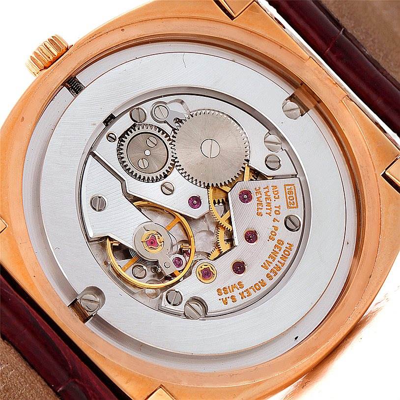 The image shows an angled view of the movement and inner workings of a Rolex Cellini 5330 Men
s Rose Gold White Dial 5330 Men
s Rose Gold White Dial model watch.