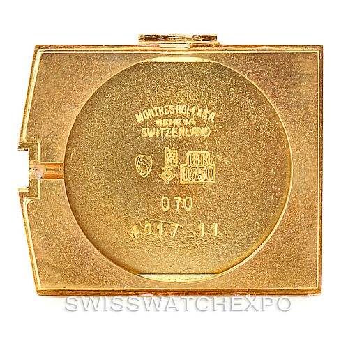 This image shows the back casing of a Rolex Cellini 4017 Men's Yellow Gold Champagne Dial 4017 Men's Yellow Gold Champagne Dial model watch, highlighting the engravings and markings.