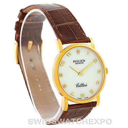 The Rolex Cellini 5115 Men's Yellow Gold Mother of Pearl Dial 5115 Men's Yellow Gold Mother of Pearl Dial watch is shown at an angle displaying the face, gold bezel, and brown leather strap.