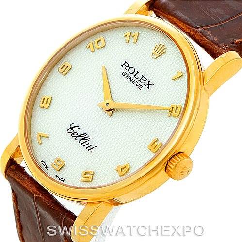 The image shows a golden Rolex Cellini 5115 Men's Yellow Gold Mother of Pearl Dial 5115 Men's Yellow Gold Mother of Pearl Dial watch from a slightly tilted angle, highlighting its dial, hands, and part of the leather strap.