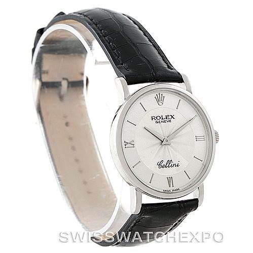 This image shows a Rolex Cellini 5115 Men's White Gold Silver Dial 5115 Men's White Gold Silver Dial watch at a three-quarter angle, highlighting its face, bezel, and leather strap.