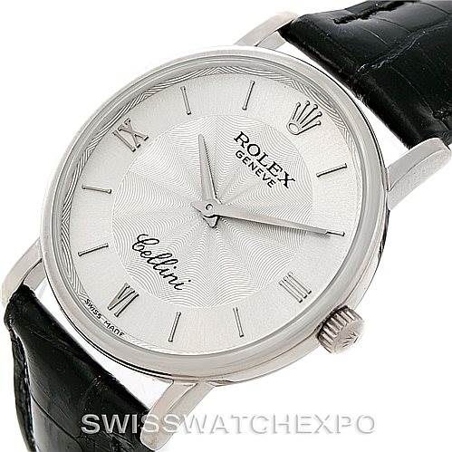This image shows a Rolex Cellini 5115 Men's White Gold Silver Dial 5115 Men's White Gold Silver Dial watch from a front angle, highlighting the dial, markers, hands, and part of the black leather strap.