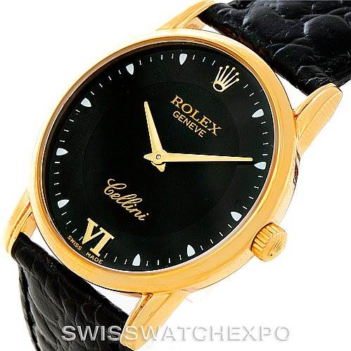 This image features a Rolex Cellini 5116 Men's Yellow Gold Black Dial 5116 Men's Yellow Gold Black Dial watch at a three-quarter angle showing the dial, crown, and part of the strap.