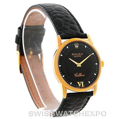 This image shows a Rolex Cellini 5116 Men's Yellow Gold Black Dial 5116 Men's Yellow Gold Black Dial watch at a three-quarter angle, highlighting its black leather strap and gold case with a black dial.