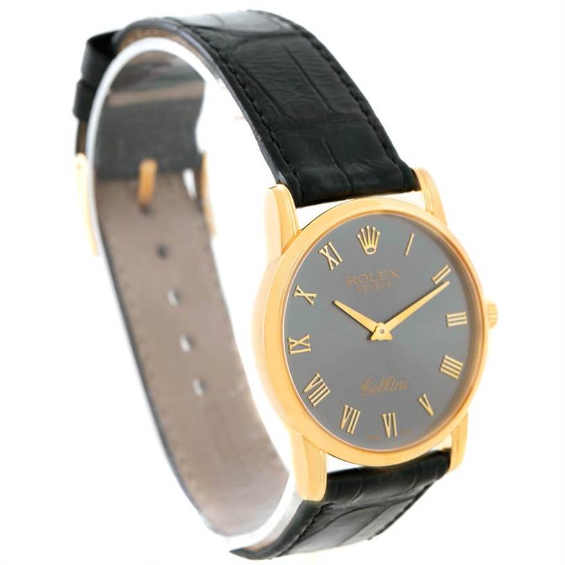 This image shows a Rolex Cellini 5116 Men's Yellow Gold Grey Dial 5116 Men's Yellow Gold Grey Dial watch from an angled front view, displaying the dial, case, and partial strap.