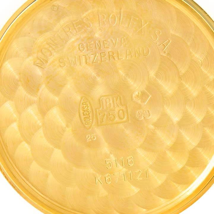 This image shows the inside case back of a Rolex Cellini 5116 Men's Yellow Gold Grey Dial 5116 Men's Yellow Gold Grey Dial watch, engraved with details such as "18K 750" and "Geneva, Switzerland."