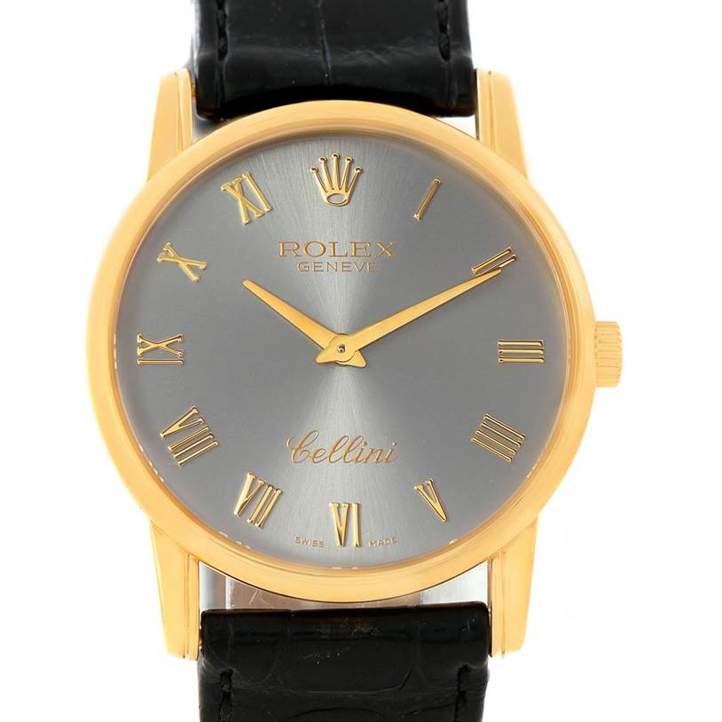 This image shows a Rolex Cellini 5116 Men's Yellow Gold Grey Dial 5116 Men's Yellow Gold Grey Dial watch from a front view, displaying its round dial, gold case, and black leather strap.