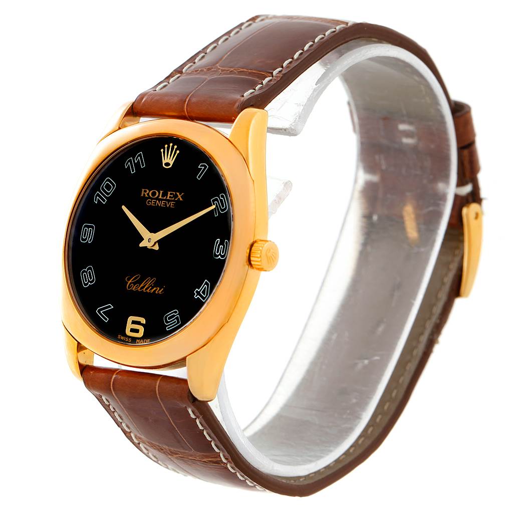 The image shows a Rolex Cellini 4233 Men's Yellow Gold Black Dial 4233 Men's Yellow Gold Black Dial watch at a three-quarter angle, highlighting the face, crown, and brown leather strap.