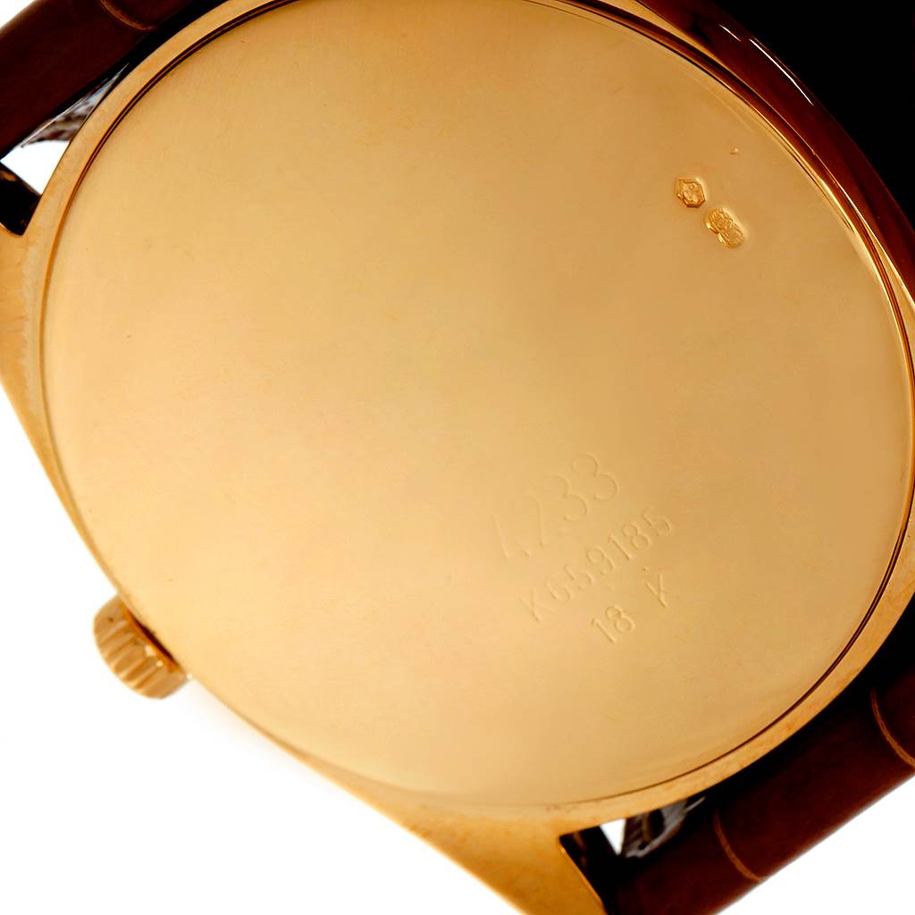 This image shows the back casing and partial side view of a Rolex Cellini 4233 Men's Yellow Gold Black Dial 4233 Men's Yellow Gold Black Dial watch.