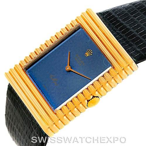 This image shows a top view of a Rolex Cellini 4012 Men's Yellow Gold Blue Dial 4012 Men's Yellow Gold Blue Dial watch displaying its rectangular face, gold bezel, crown, and a black leather strap.