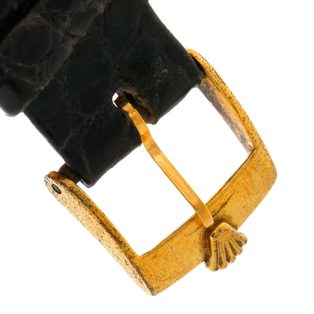 This image shows the clasp and part of the leather strap of the Rolex Cellini 4017 Men's Yellow Gold Black Dial 4017 Men's Yellow Gold Black Dial model watch.