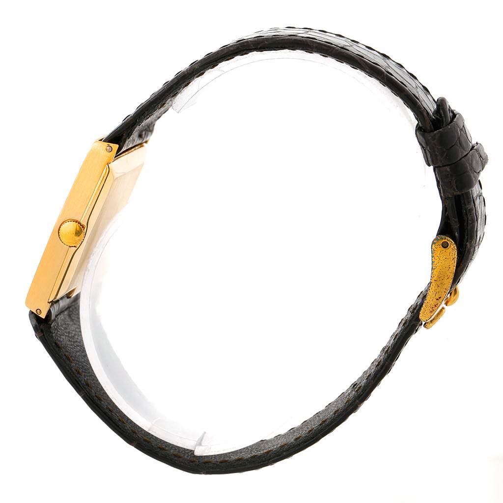 The image shows a side view of the Rolex Cellini 4017 Men's Yellow Gold Black Dial 4017 Men's Yellow Gold Black Dial watch, highlighting the gold case and black leather strap.