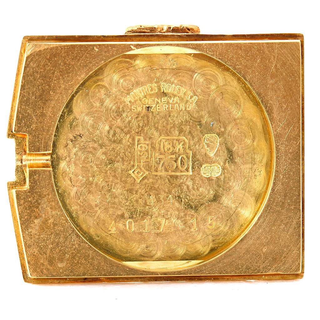 The image shows the back case of a Rolex Cellini 4017 Men's Yellow Gold Black Dial 4017 Men's Yellow Gold Black Dial watch, highlighting engravings and hallmarks.