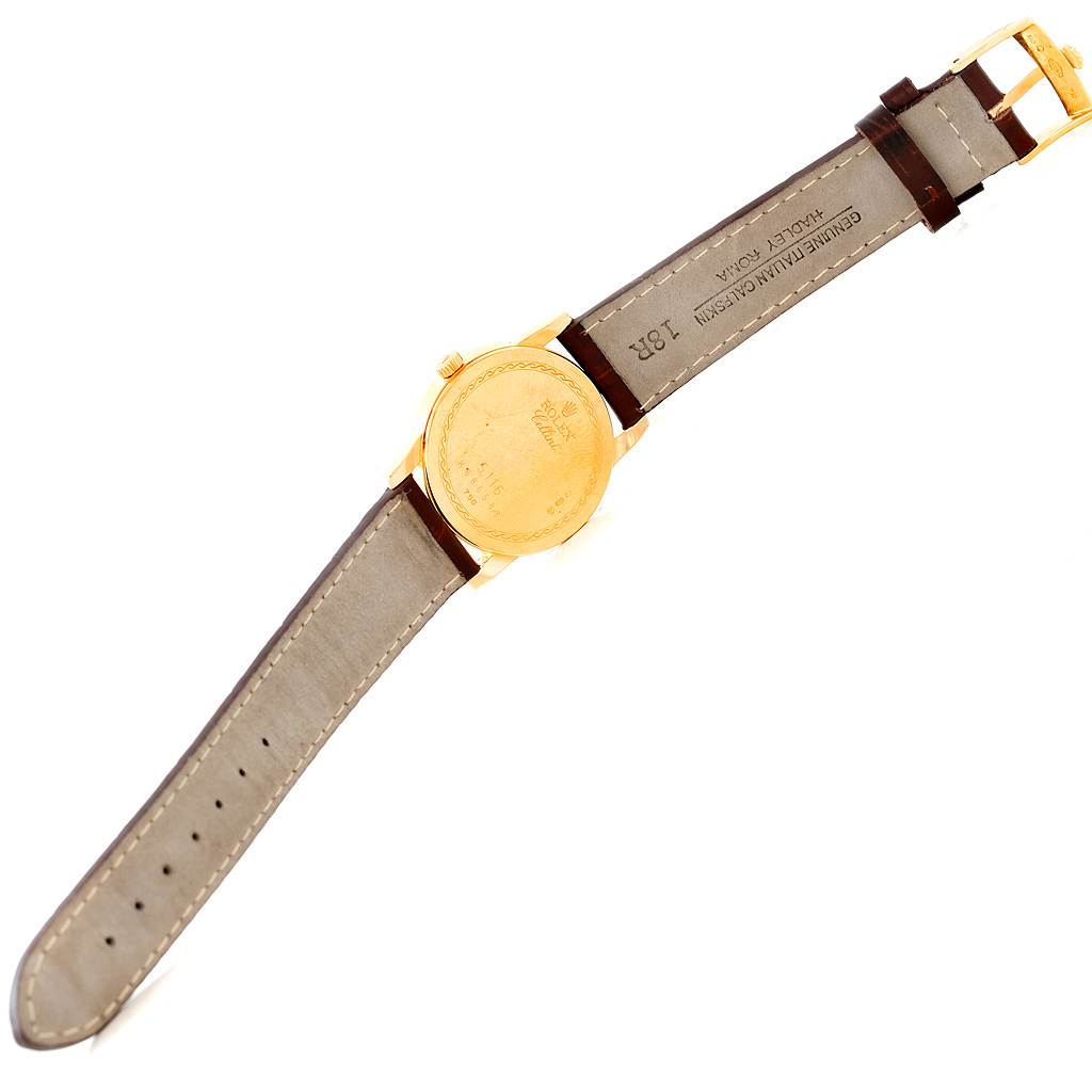 The image shows the back and strap of a Rolex Cellini 5116 Men's Yellow Gold Beige Dial 5116 Men's Yellow Gold Beige Dial watch laid flat, highlighting the case back and clasp.