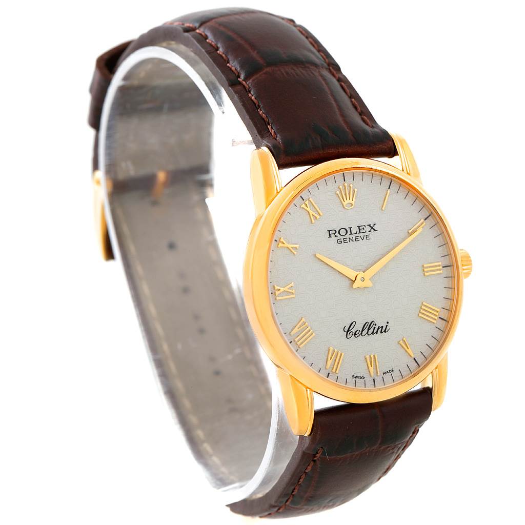 The image shows a side-front angle of a Rolex Cellini 5116 Men's Yellow Gold Beige Dial 5116 Men's Yellow Gold Beige Dial watch with a gold case and brown leather strap.