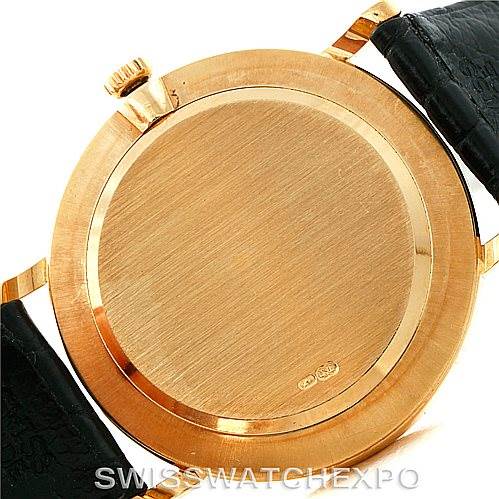 This is the back side view of a Rolex Cellini 5112 Men
s Yellow Gold Champagne Dial 5112 Men
s Yellow Gold Champagne Dial watch, showcasing the case and part of the leather strap.