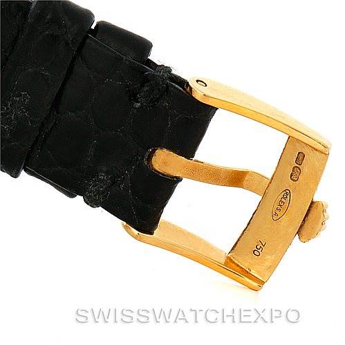This image shows the buckle of a Rolex Cellini 5112 Men
s Yellow Gold Champagne Dial 5112 Men
s Yellow Gold Champagne Dial watch, highlighting the black leather strap and gold clasp.